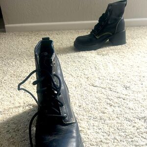 Black sketcher boots